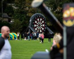 A huge inflatable dart board in a spacious field as part of GOTO Creates - Liberty Global